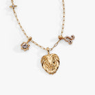 Gold Leo Zodiac Charm Cluster Necklace by ALEX AND ANI featuring stainless steel chain with zodiac-themed charms.