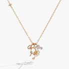 Gold stainless steel Scorpio Zodiac Charm Cluster Necklace by ALEX AND ANI featuring a detailed Scorpio pendant and chain.
