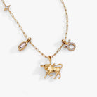 Gold Taurus zodiac charm cluster necklace by ALEX AND ANI featuring stainless steel design and zodiac symbol pendant.