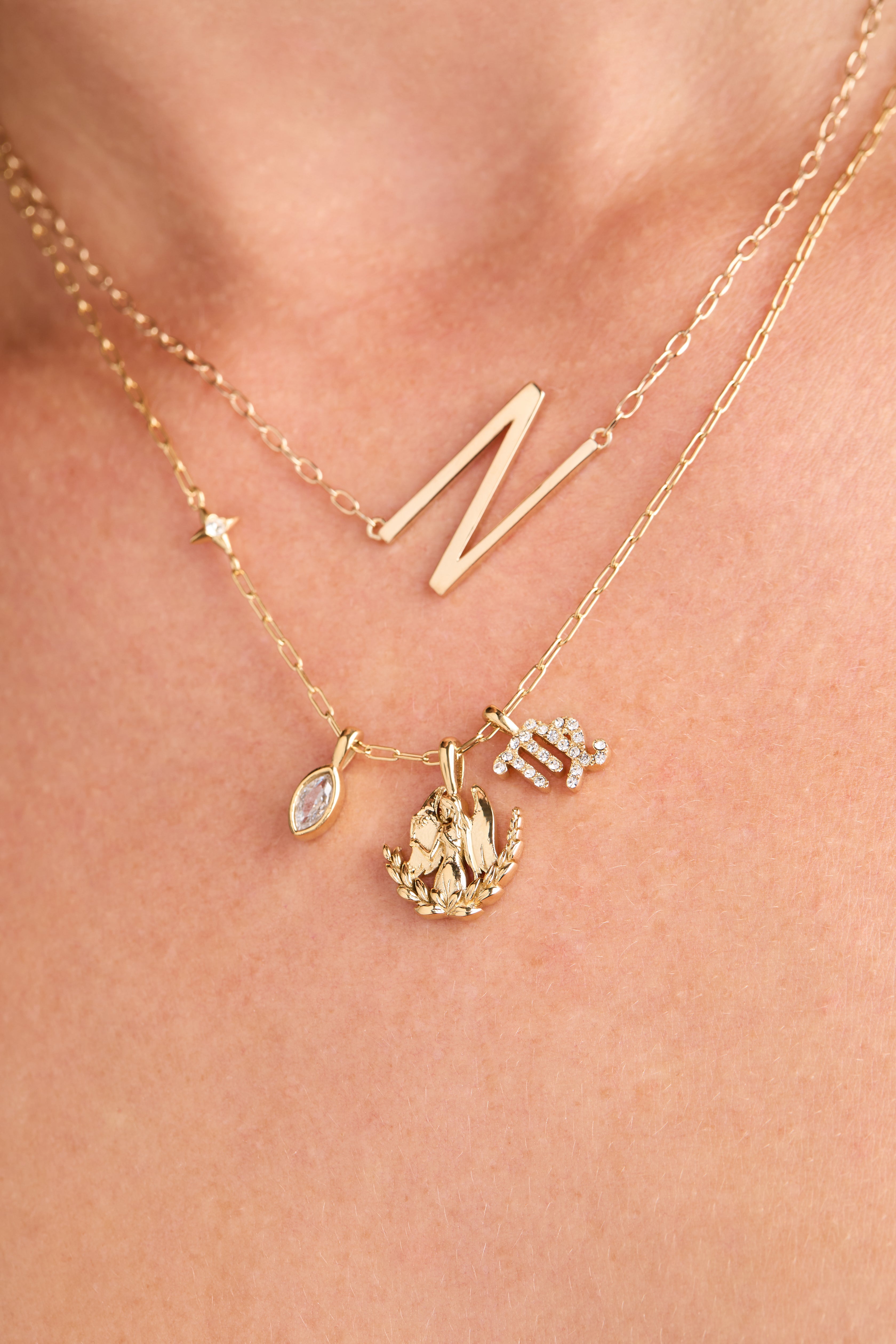 Gold Virgo zodiac charm cluster necklace by ALEX AND ANI featuring stainless steel chain and celestial design.