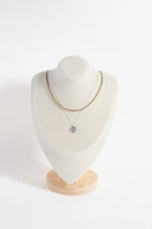 Sterling silver Aries zodiac necklace by ALEX AND ANI featuring a detailed Aries symbol pendant.