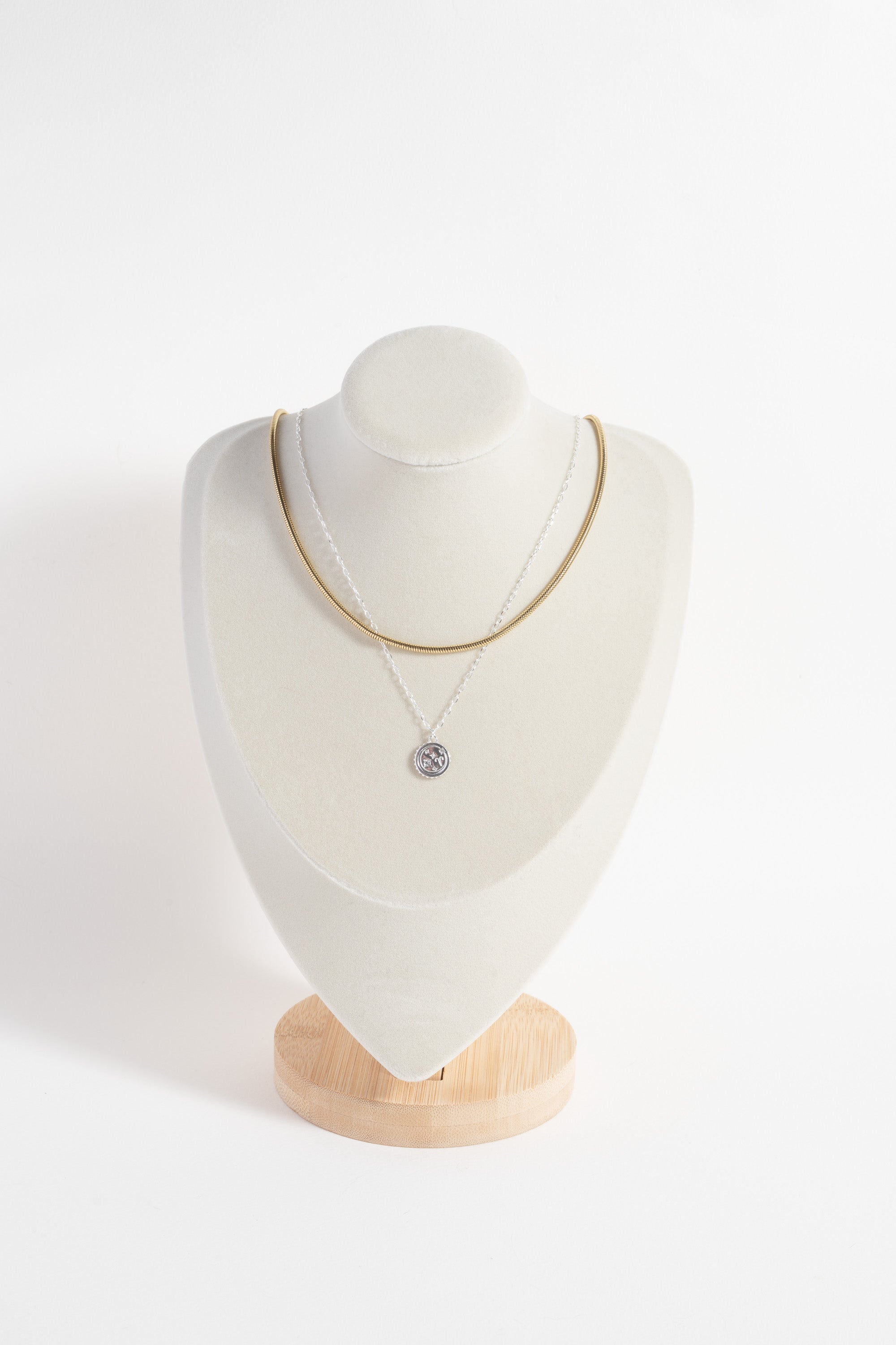 Sterling silver Aries zodiac necklace by ALEX AND ANI featuring a detailed Aries symbol pendant.