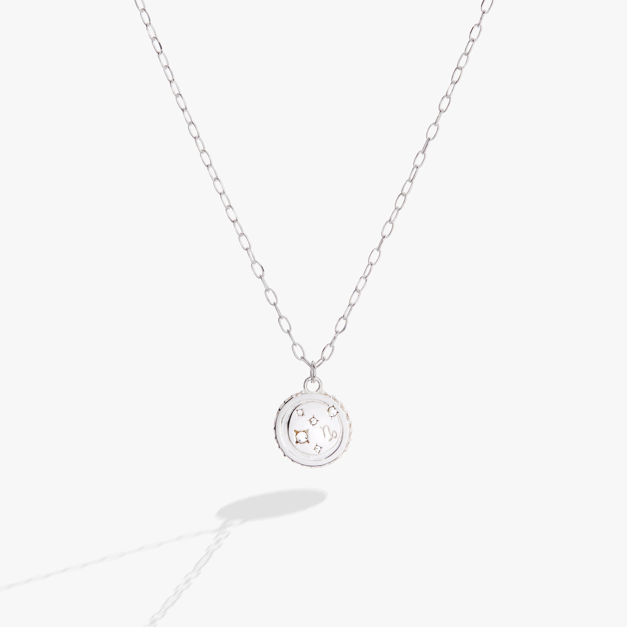 Sterling silver Capricorn Zodiac necklace by ALEX AND ANI featuring a detailed Capricorn symbol pendant.