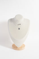Sterling silver Libra Zodiac Necklace by ALEX AND ANI featuring a detailed Libra symbol pendant.