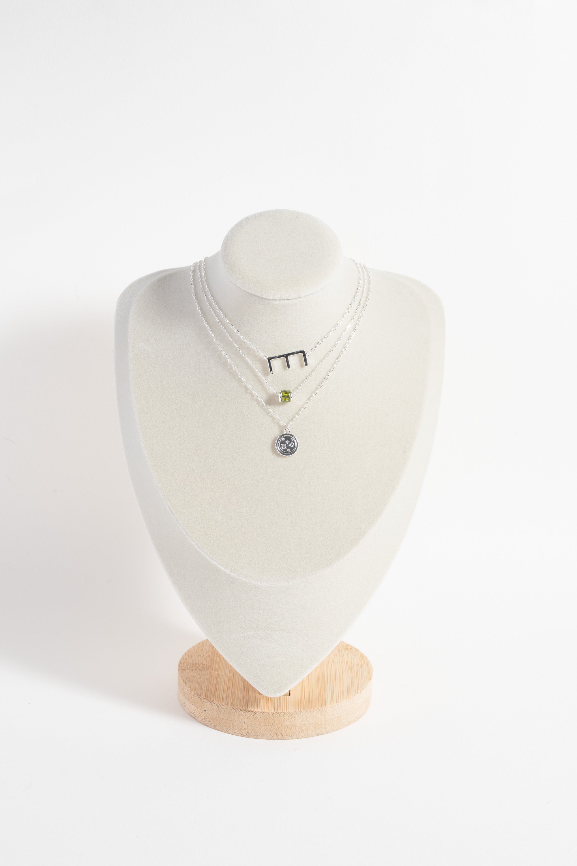 Sterling silver Libra Zodiac necklace by ALEX AND ANI featuring a pendant with the Libra symbol and intricate design.