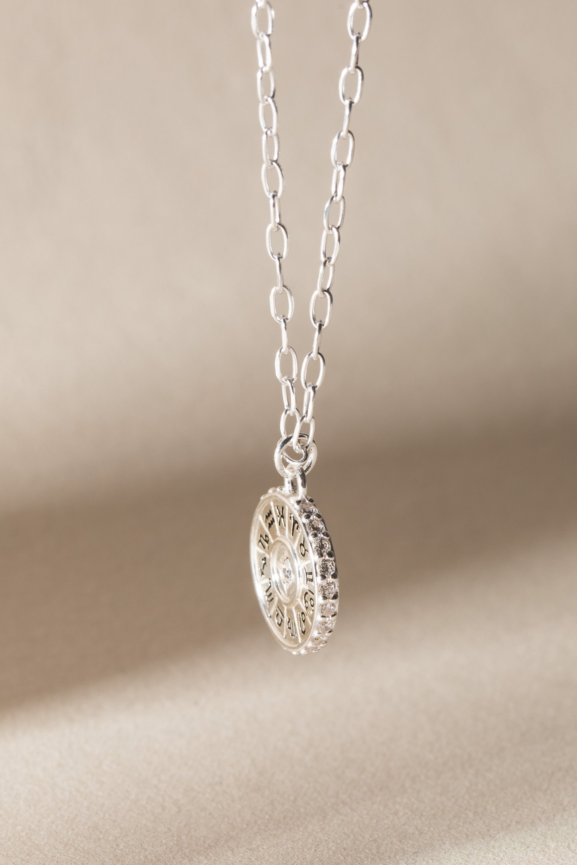 Sterling silver Virgo zodiac necklace by ALEX AND ANI featuring a detailed Virgo symbol pendant on a delicate chain.