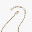 Tri-tone engraved pendant necklace featuring a coffee bean with symbols for happiness, wealth, and health by ALEX AND ANI.