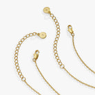 Set of two Harry Potter™ Chocolate Frog necklaces by ALEX AND ANI featuring two-tone charm pendants.