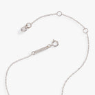 ALEX AND ANI PEEPS® Precious Peepsake Necklace featuring two-tone charm on a delicate chain, stylish jewelry accessory.