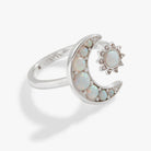 Shiny silver Moon and Sun Opal Ring by ALEX AND ANI featuring celestial design and vibrant opal accents.