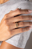 Gold stainless steel Aquarius Zodiac Ring by ALEX AND ANI featuring a detailed Aquarius symbol and a sleek band design.