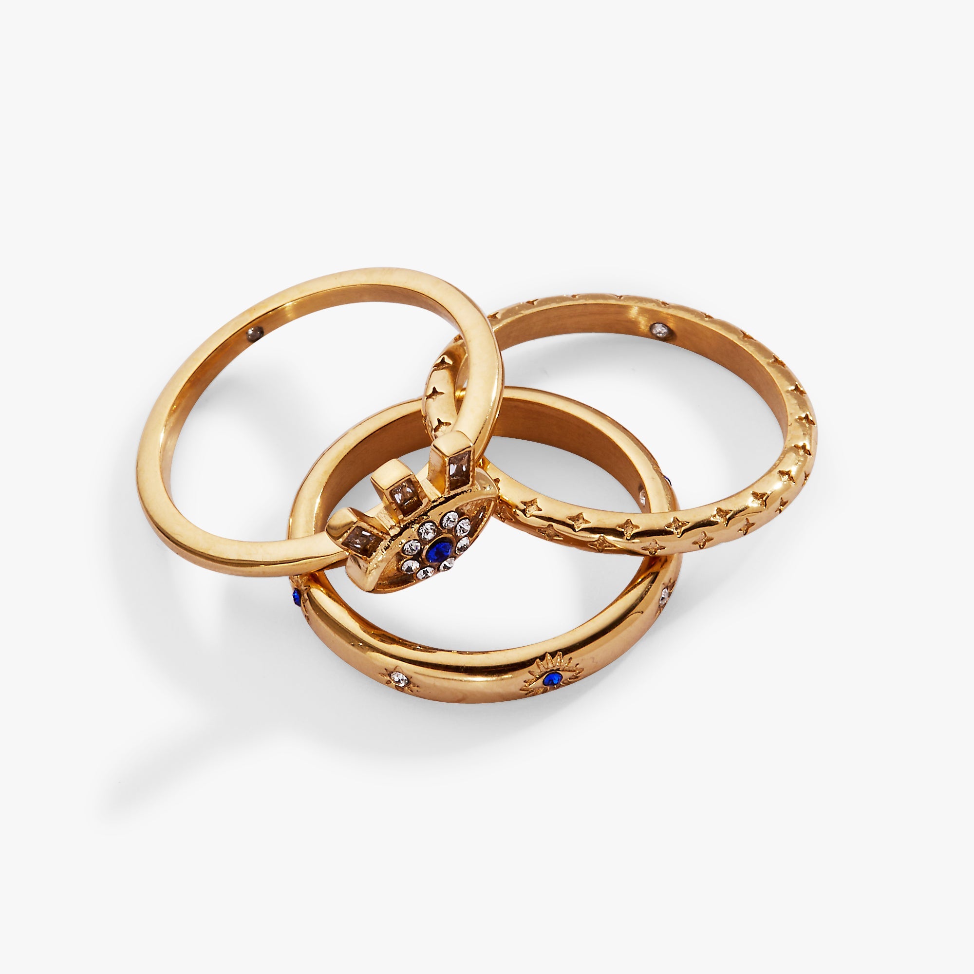 Set of three gold stainless steel Evil Eye stacking rings by ALEX AND ANI, featuring eye designs and adjustable fit.