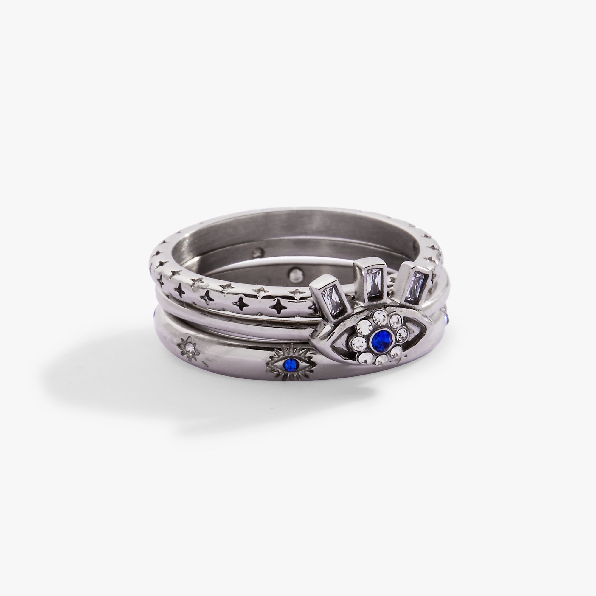 Set of three gold stainless steel Evil Eye stacking rings by ALEX AND ANI, featuring intricate eye designs and smooth bands.