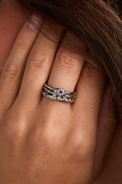 Set of three gold stainless steel Evil Eye stacking rings by ALEX AND ANI, featuring intricate eye designs and smooth bands.