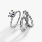 Set of three gold stainless steel Evil Eye stacking rings by ALEX AND ANI, featuring intricate eye designs and smooth bands.