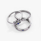 Set of three gold stainless steel Evil Eye stacking rings by ALEX AND ANI, featuring eye motifs and sleek design.