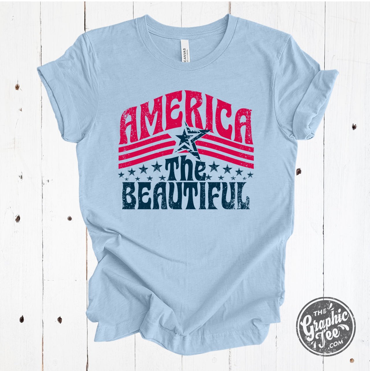 America the Beautiful short sleeve graphic tee by The Graphic Tee featuring patriotic artwork on a classic cotton T-shirt.