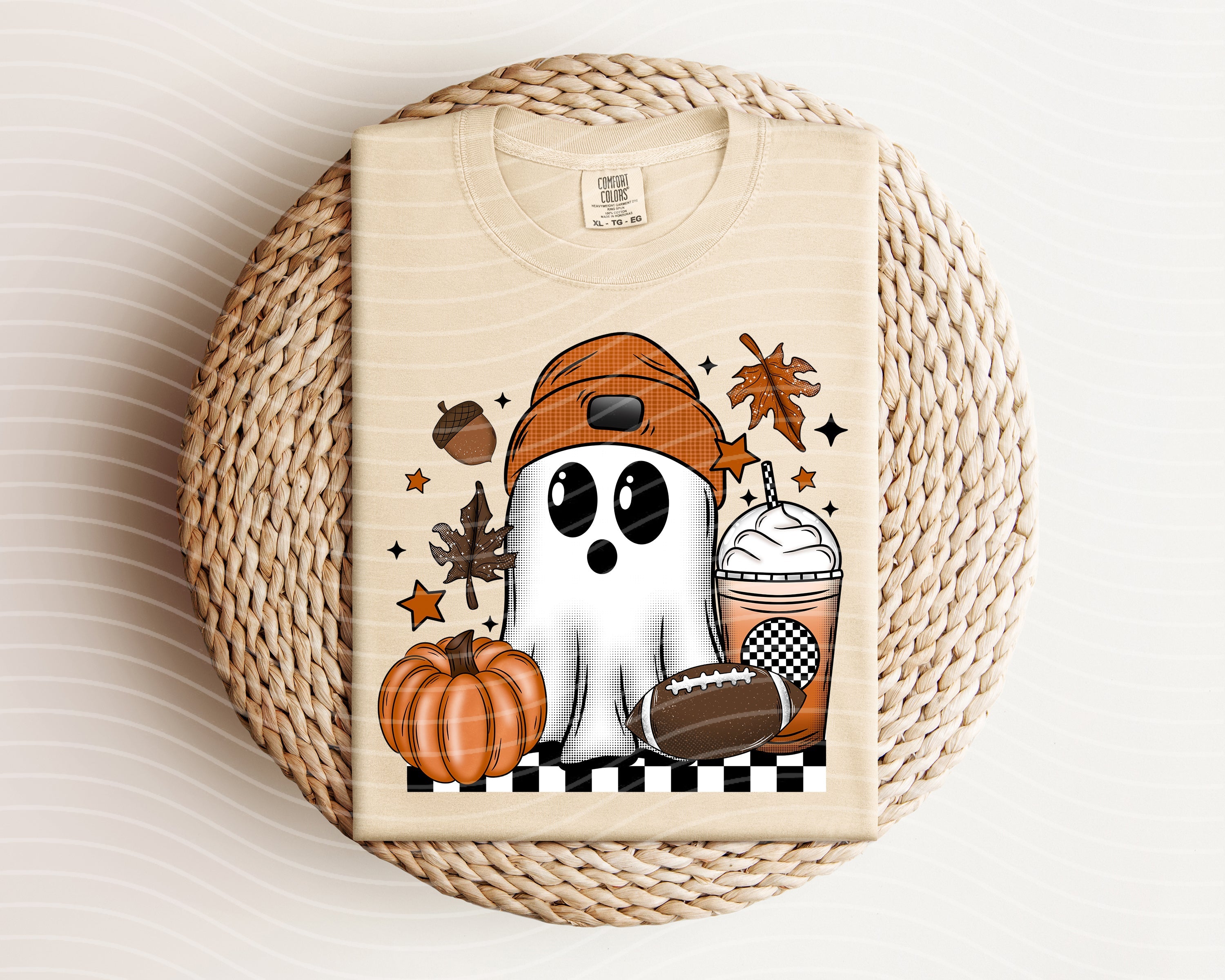 Football Ghost graphic tee by Anchored Grace Boutique featuring a spooky ghost design on a casual t-shirt.