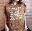 White autumn graphic tee by Anchored Grace Boutique featuring fall-inspired designs on soft cotton fabric.