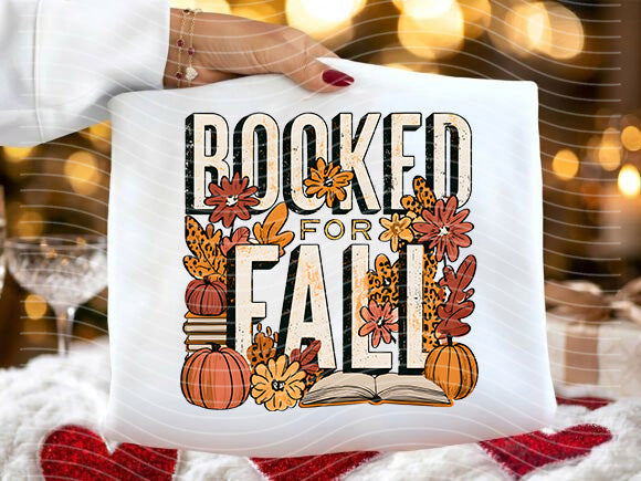White graphic tee by Anchored Grace Boutique featuring "Booked for Fall" design on Bella style cotton t-shirt.