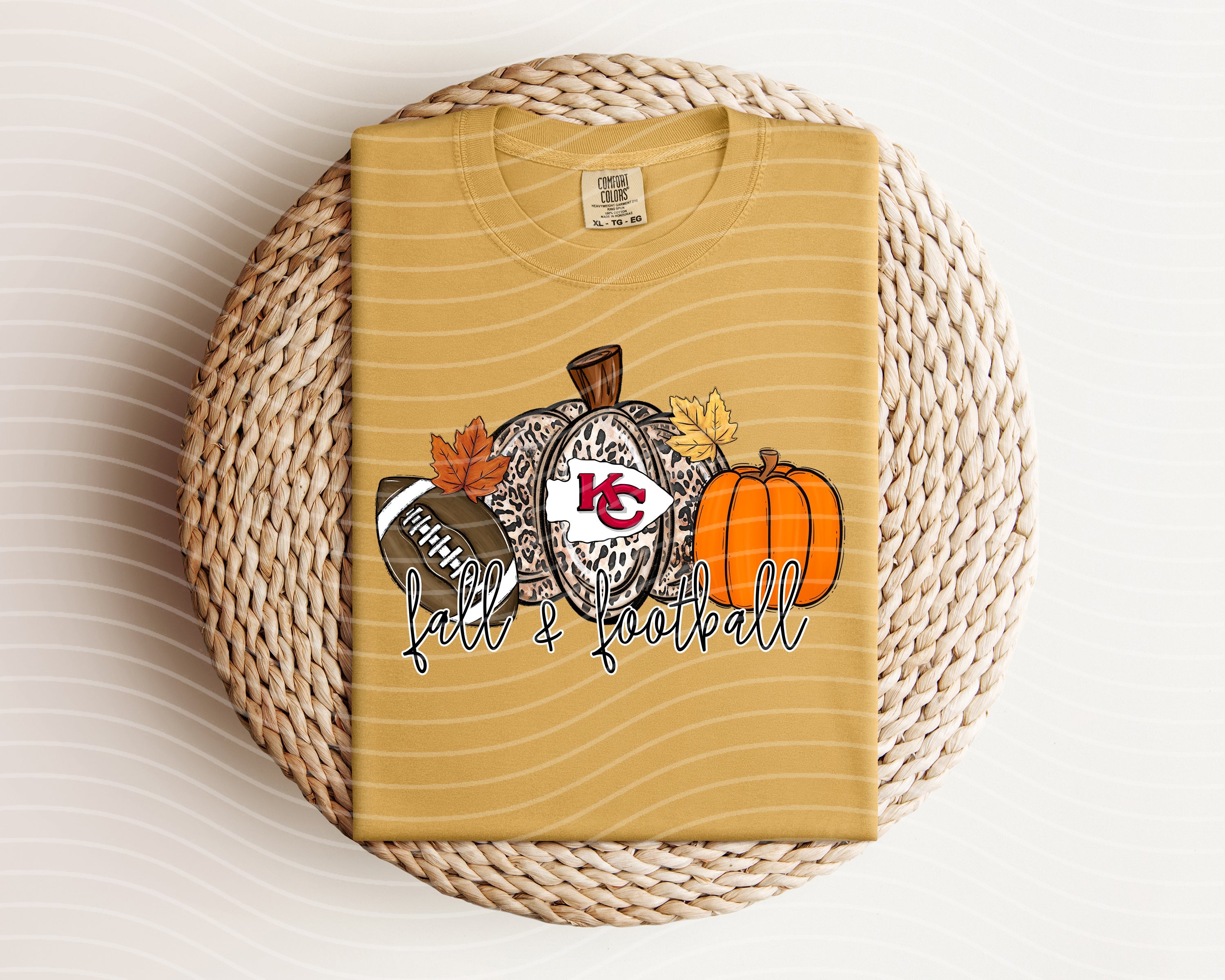 Football-themed graphic tee by Anchored Grace Boutique featuring fall colors and Chiefs logo design.