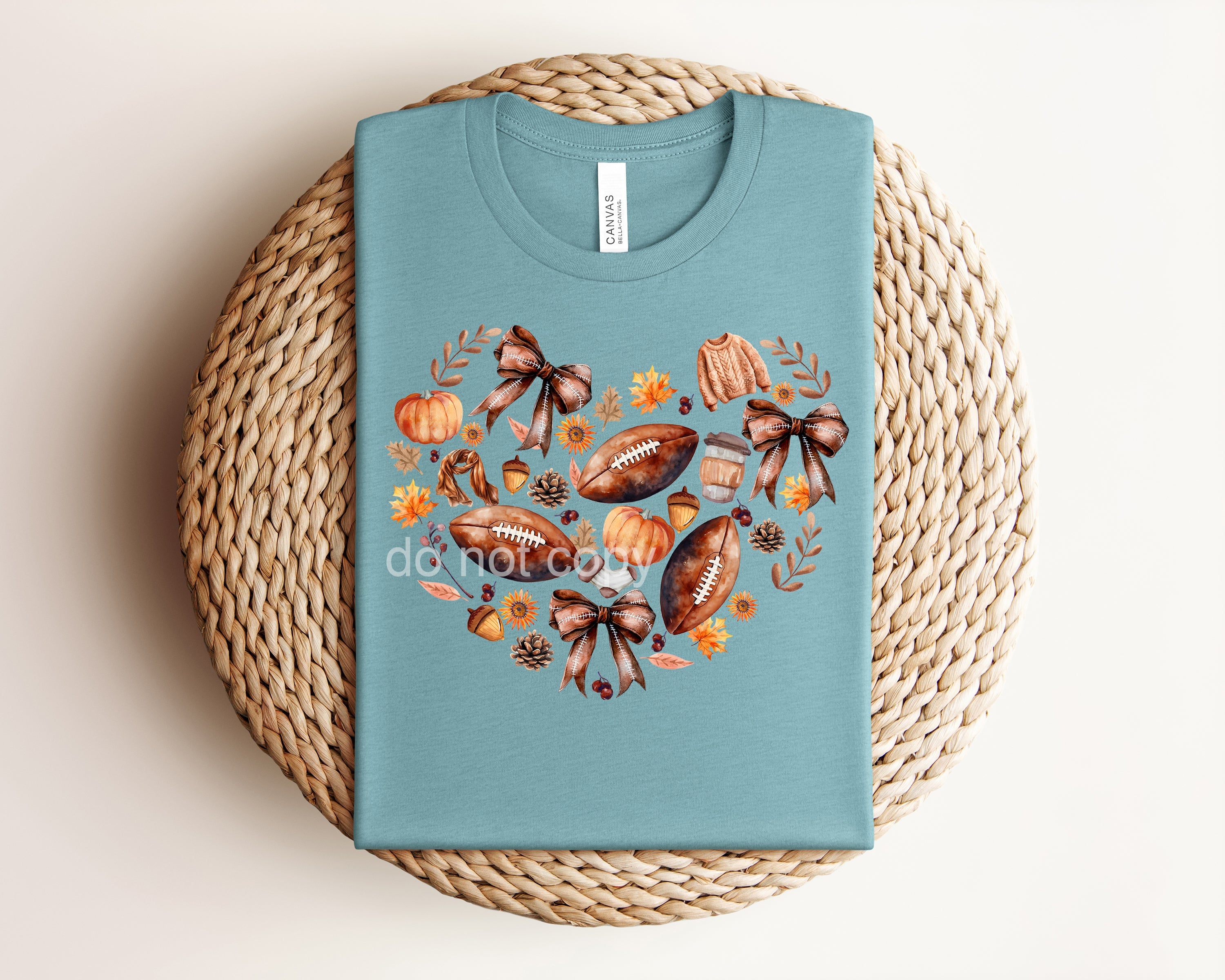 Fall Football Heart Graphic Tee from Anchored Grace Boutique featuring a football and heart design on a casual t-shirt.