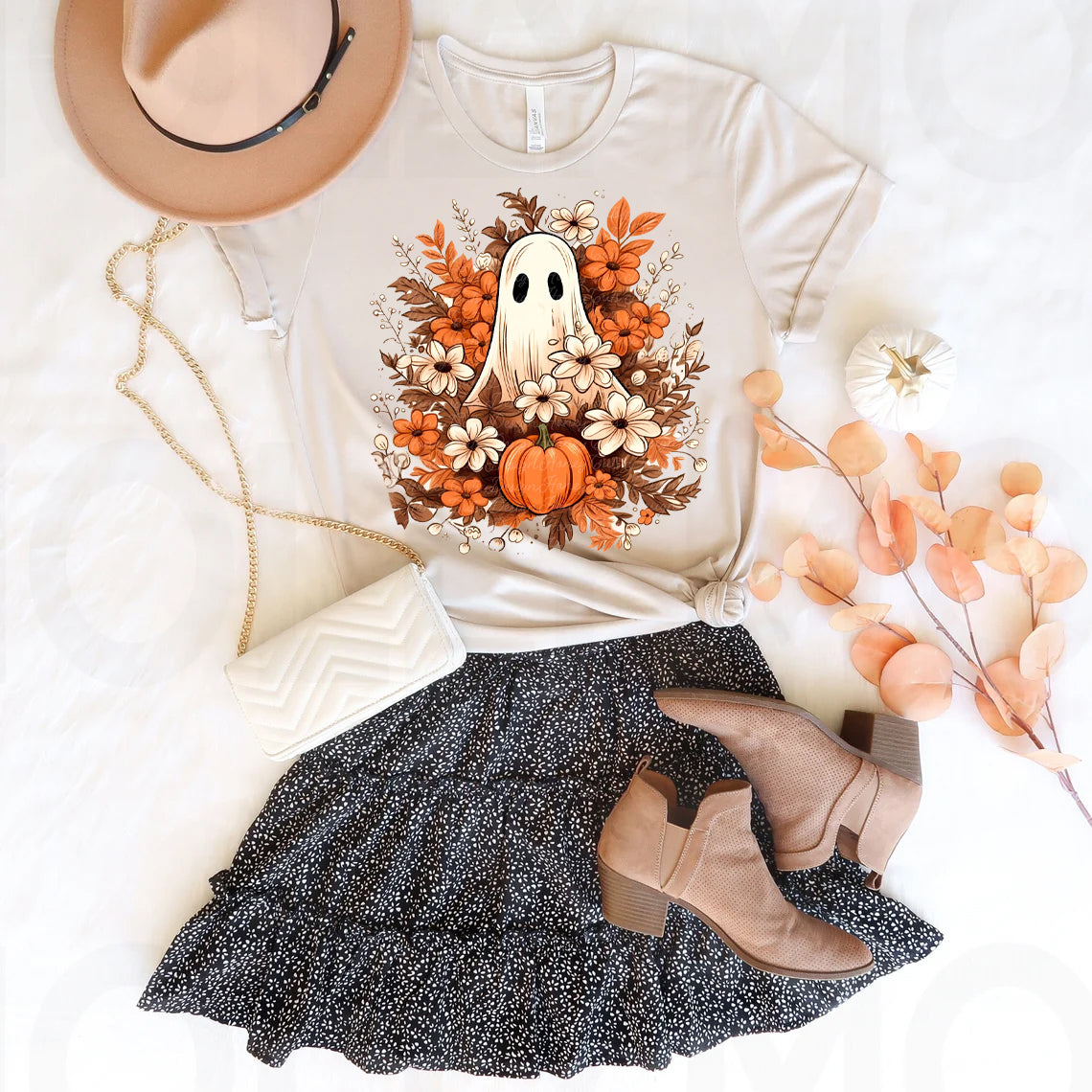 White Fall Ghost Graphic Tee by Anchored Grace Boutique featuring a spooky ghost design on a casual T-shirt.