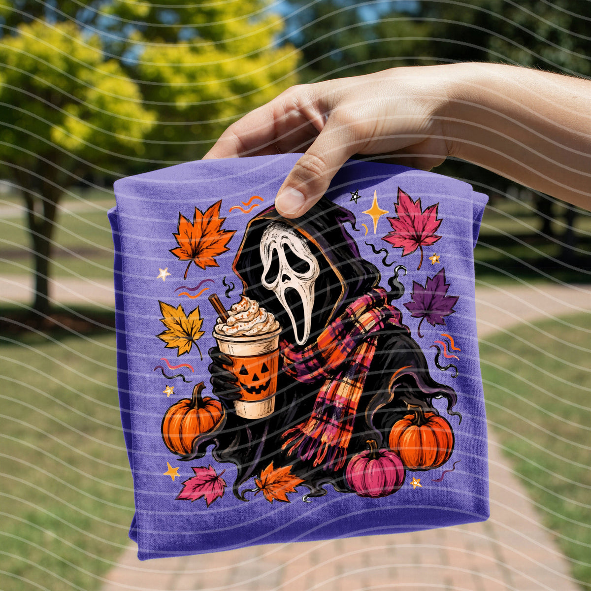 White Fall Scream graphic tee from Anchored Grace Boutique featuring a spooky Halloween-inspired design on soft cotton fabric.