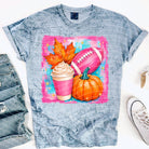 White football and fall graphic tee by Anchored Grace Boutique, featuring seasonal autumn and sports-themed design.