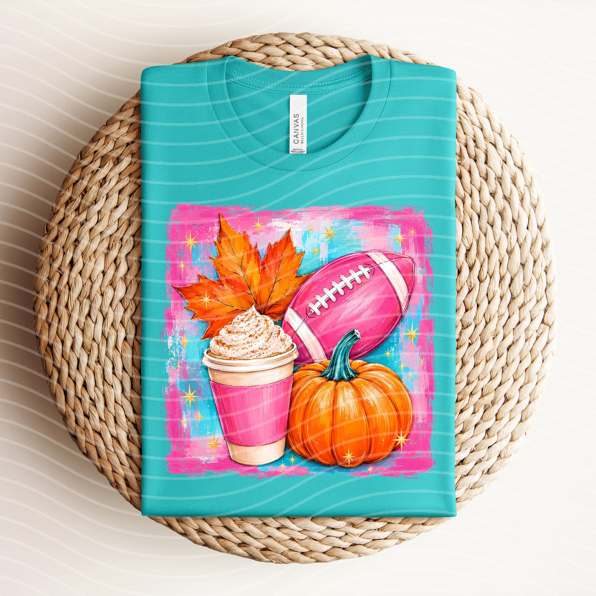 Football and fall-themed graphic tee by Anchored Grace Boutique featuring seasonal autumn and football designs on soft fabric.