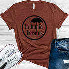 White graphic tee from Anchored Grace Boutique featuring a Gilmore Girls "In Omnia Paratus" design on the front.