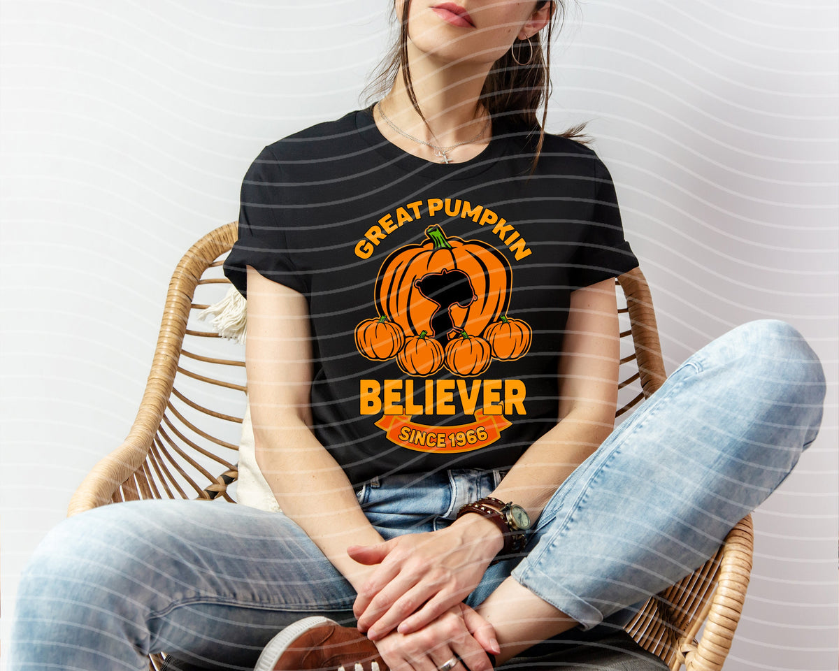 White Great Pumpkin Believer graphic tee by Anchored Grace Boutique featuring a Halloween-themed pumpkin design on the front.