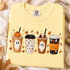 White Bella graphic tee from Anchored Grace Boutique featuring a "Hello Fall Coffee" fall-themed design on the front.