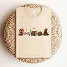 White HP Icons graphic tee by Anchored Grace Boutique featuring a bold printed design on soft cotton fabric.