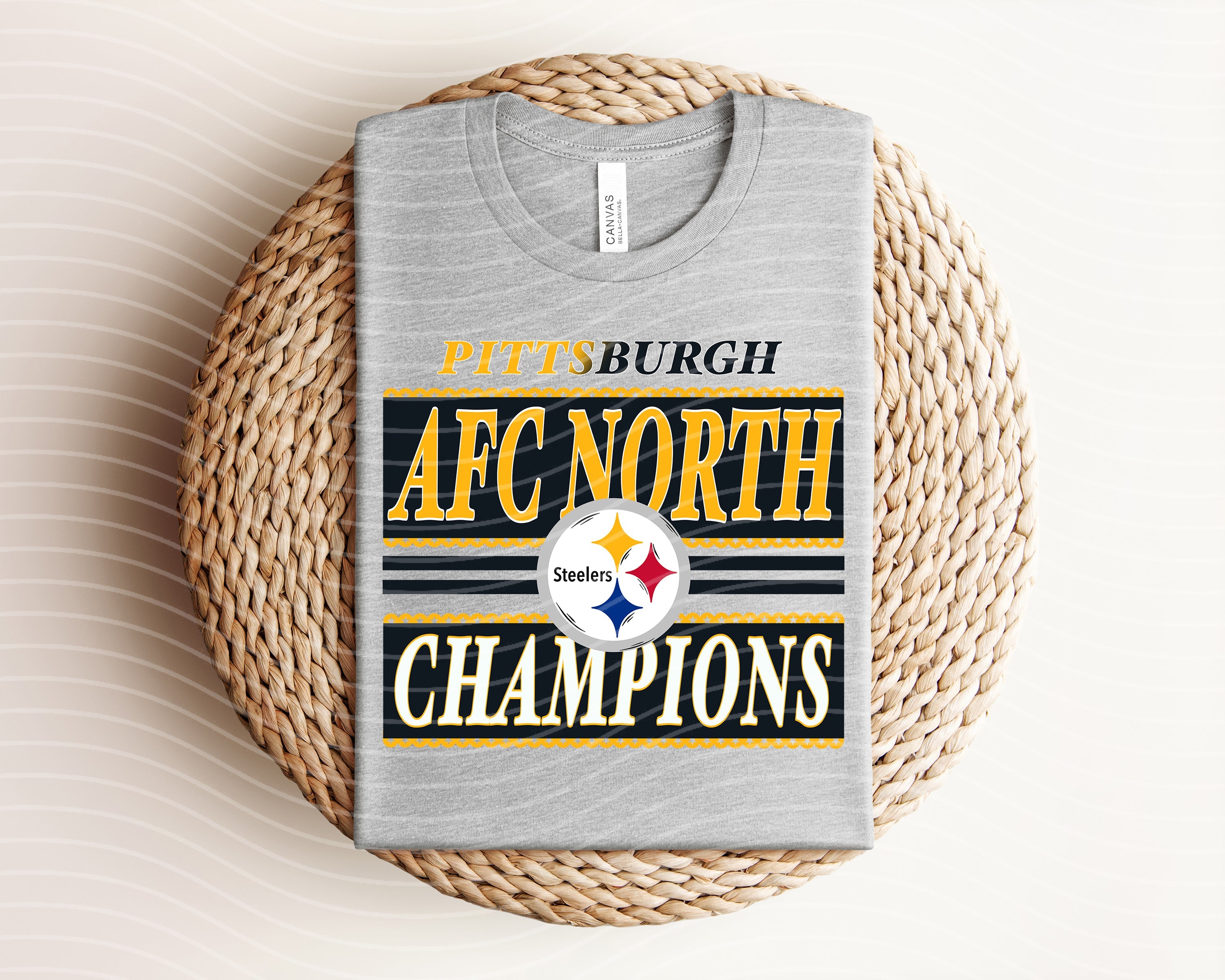 Black AFC North Champions Steelers graphic tee featuring team logo and bold text, casual apparel from Anchored Grace Boutique.