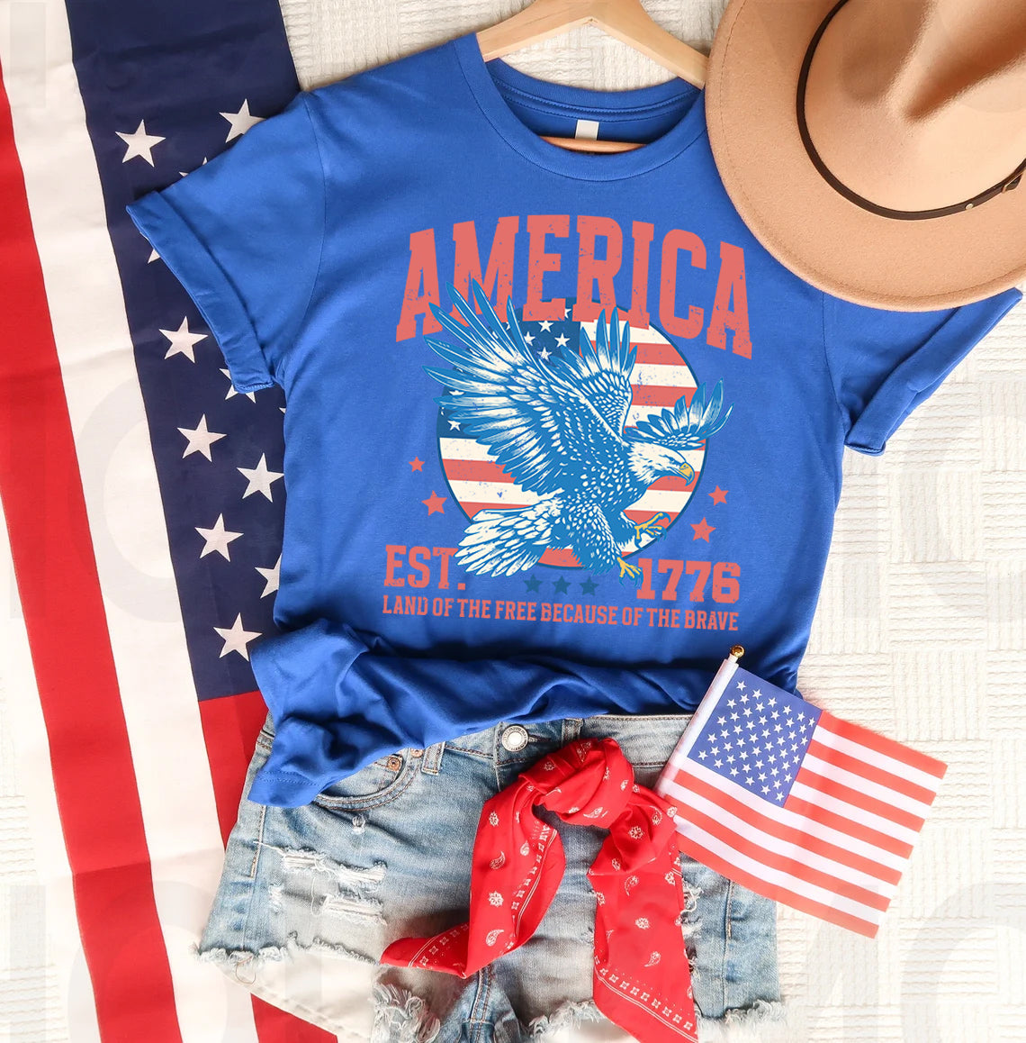 America graphic tee by Anchored Grace Boutique featuring a patriotic design on a casual t-shirt.