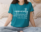 Apparently I'm Not Allowed to Adopt All the Dogs graphic tee from Anchored Grace Boutique, featuring a humorous dog-themed design.