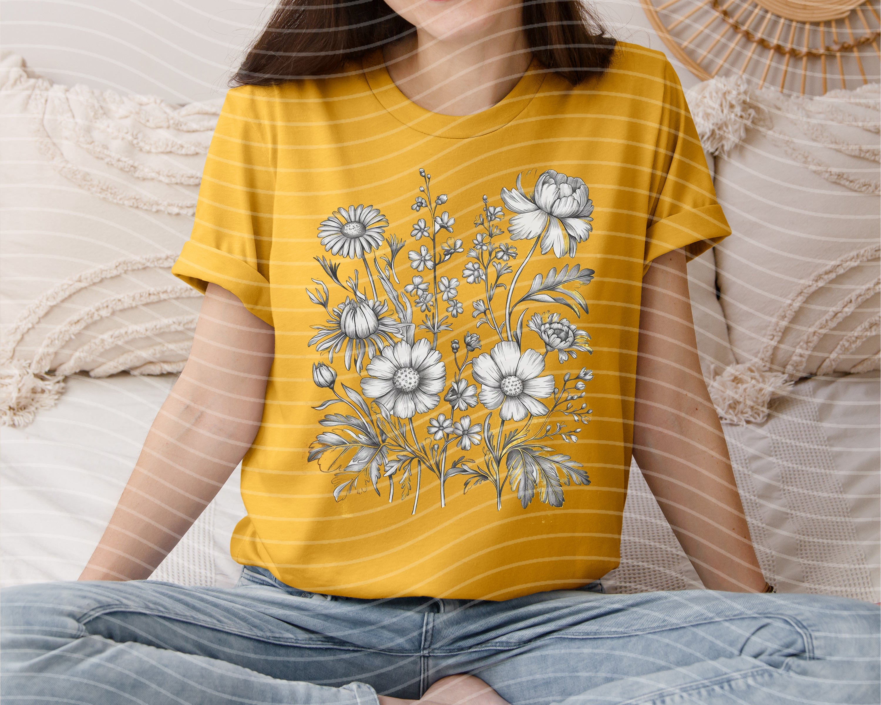 Black and white floral graphic T-shirt from Anchored Grace Boutique featuring a stylish flower print design.