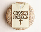Black graphic tee by Anchored Grace Boutique featuring the "Chosen Not Forsaken" design with bold white text.