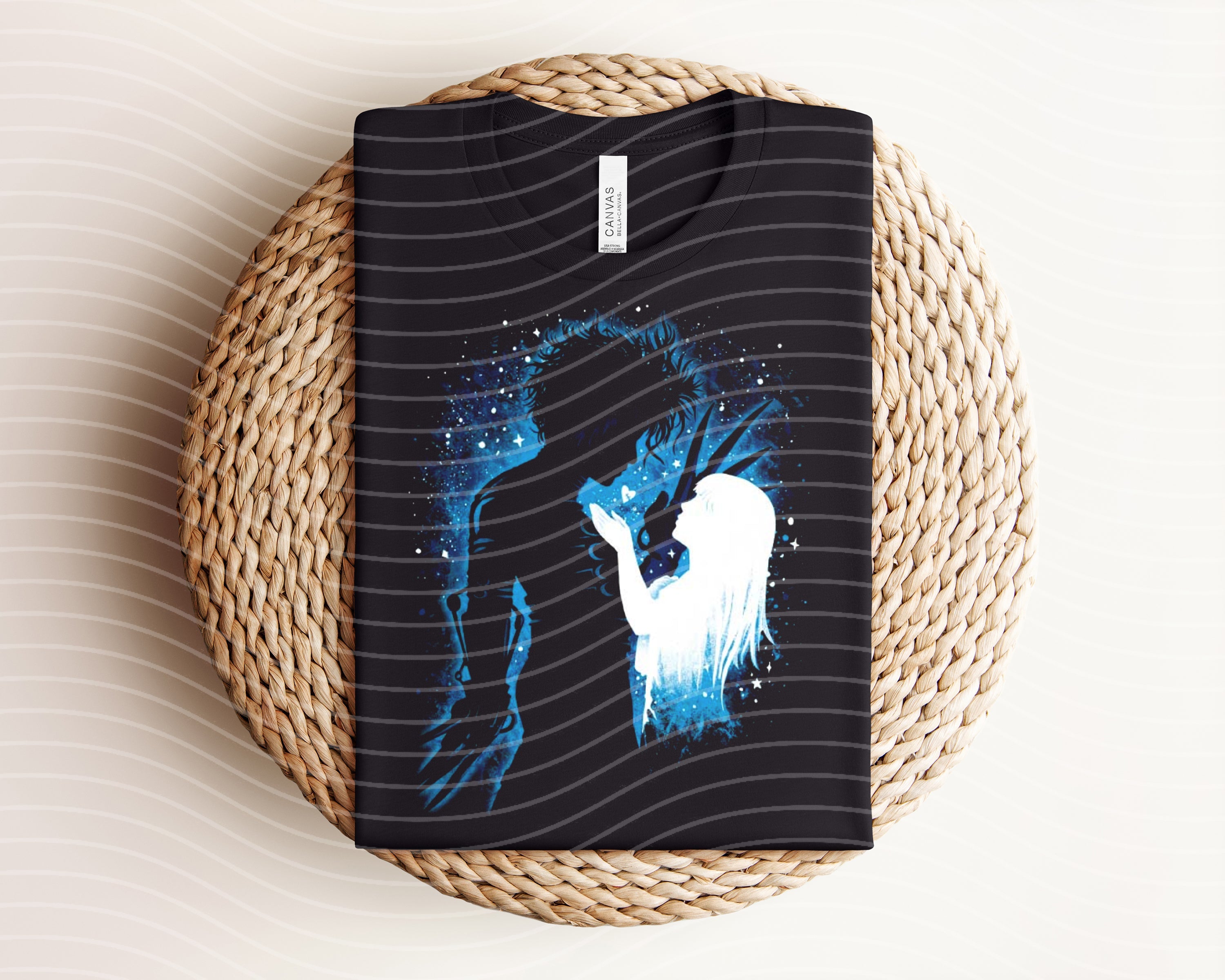 Dark graphic tee featuring Edward Scissorhands design from Anchored Grace Boutique, showcasing detailed artwork on the front.