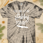 Feeling a Tad Bit Stabby Today graphic tee from Anchored Grace Boutique, featuring bold text on a casual cotton T-shirt.