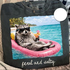 Feral and Salty graphic tee by Anchored Grace Boutique featuring bold, nautical-inspired design on soft cotton fabric.