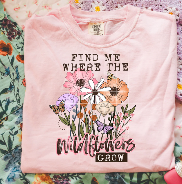 Find Me Where the Wildflowers Grow graphic tee by Anchored Grace Boutique, featuring a floral design on a casual t-shirt.