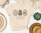 Green Gilmore Ghouls graphic tee by Anchored Grace Boutique featuring a vibrant, spooky design on a casual cotton t-shirt