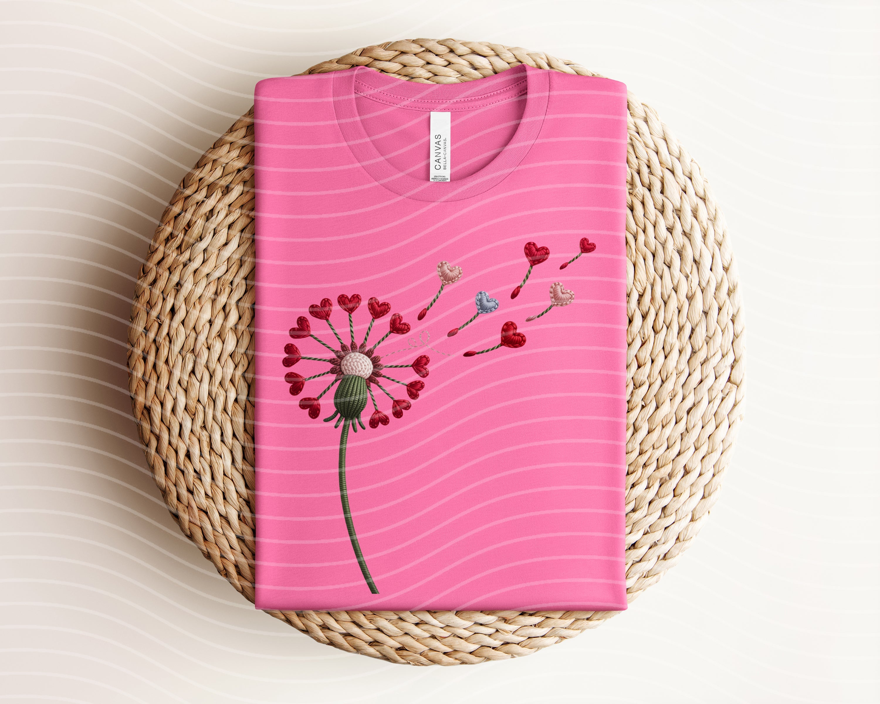 Heart dandelion graphic tee by Anchored Grace Boutique featuring a floral design on soft cotton fabric.
