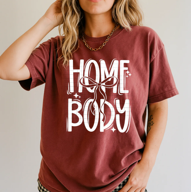 Black Homebody graphic tee by Anchored Grace Boutique featuring a stylish, casual design with a comfortable fit.