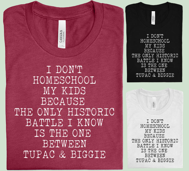 Black graphic tee from Anchored Grace Boutique with the phrase "I Don't Homeschool My Kids" printed in white text.