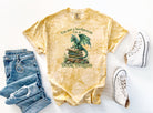 I'm a Book Dragon graphic tee by Anchored Grace Boutique featuring a colorful book and dragon illustration on a casual t-shirt.