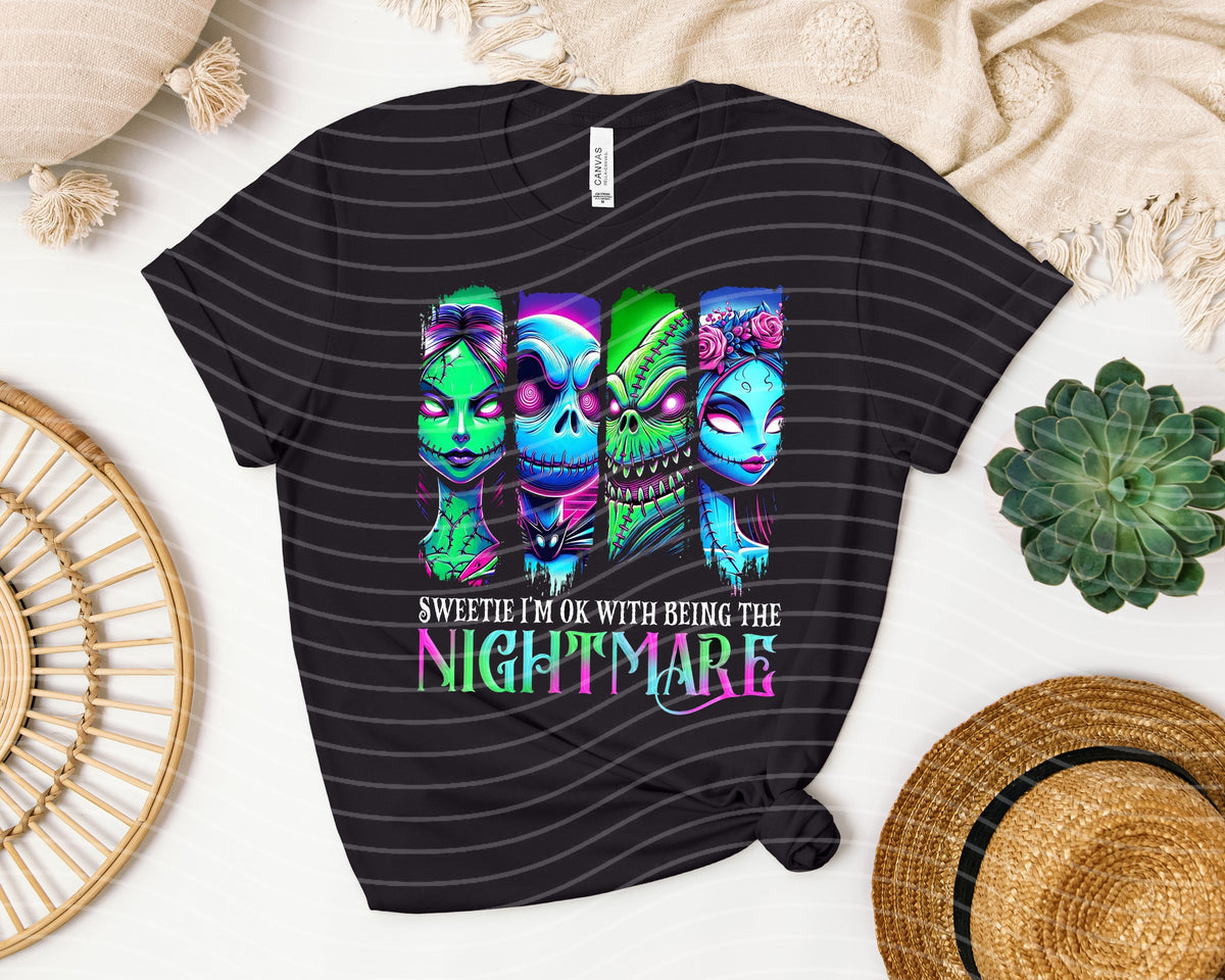 Black graphic tee from Anchored Grace Boutique featuring the phrase "I'm Ok with Being the Nightmare" in bold lettering.