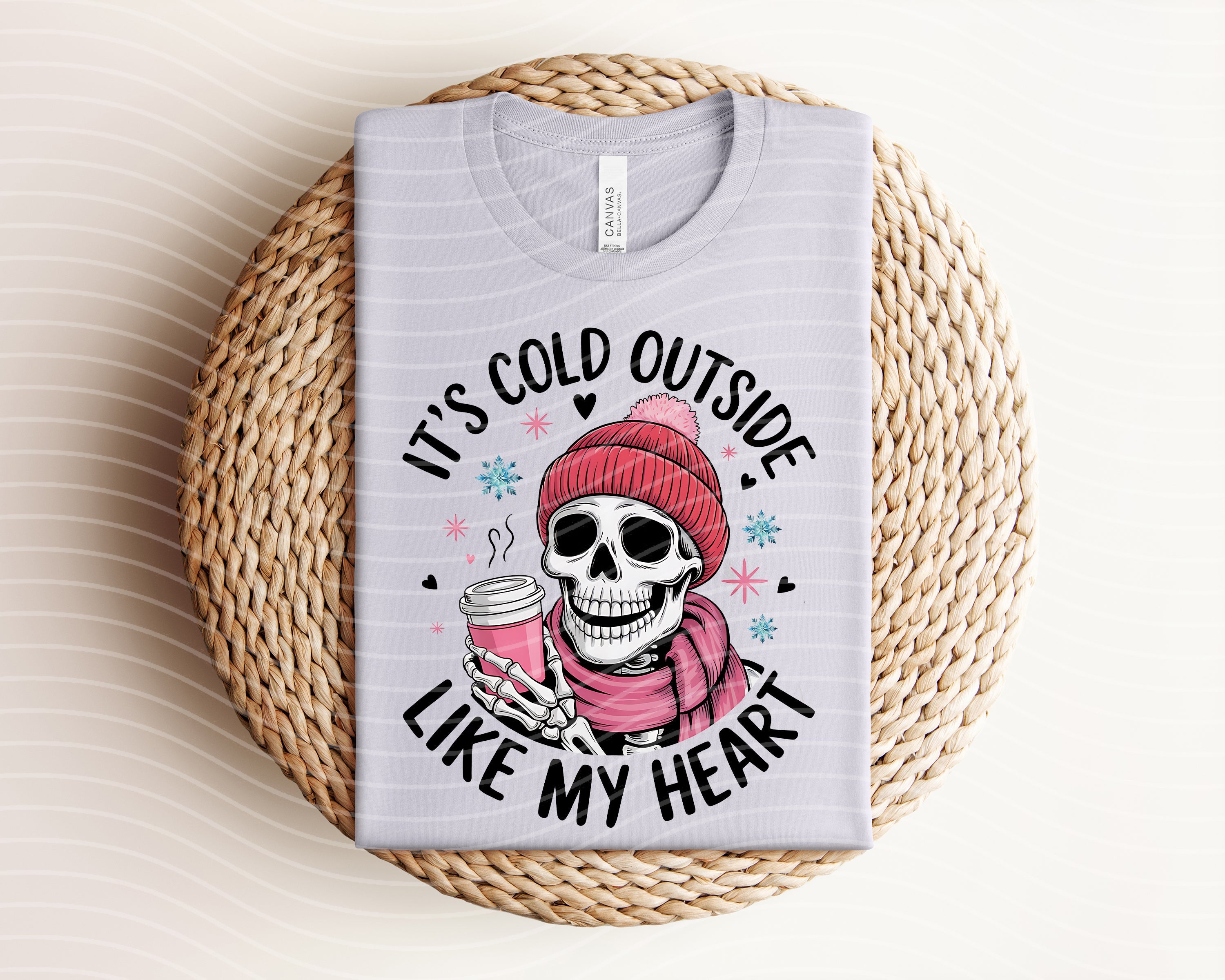 It's Cold Outside Like My Heart graphic tee from Anchored Grace Boutique featuring a stylish design on a casual t-shirt.
